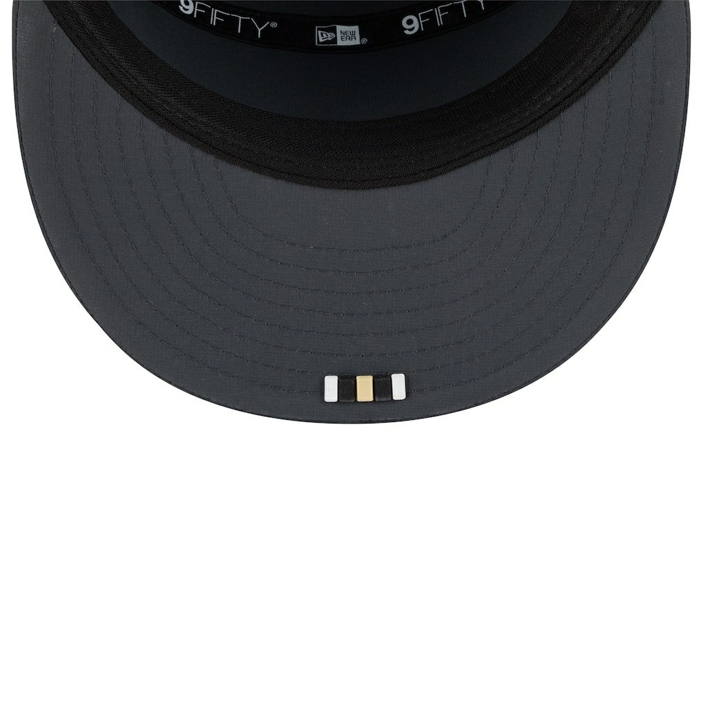 New Orleans Saints New Era 2025 Sideline Cold Weather Split Panel 9FIFTY Snapback Hat