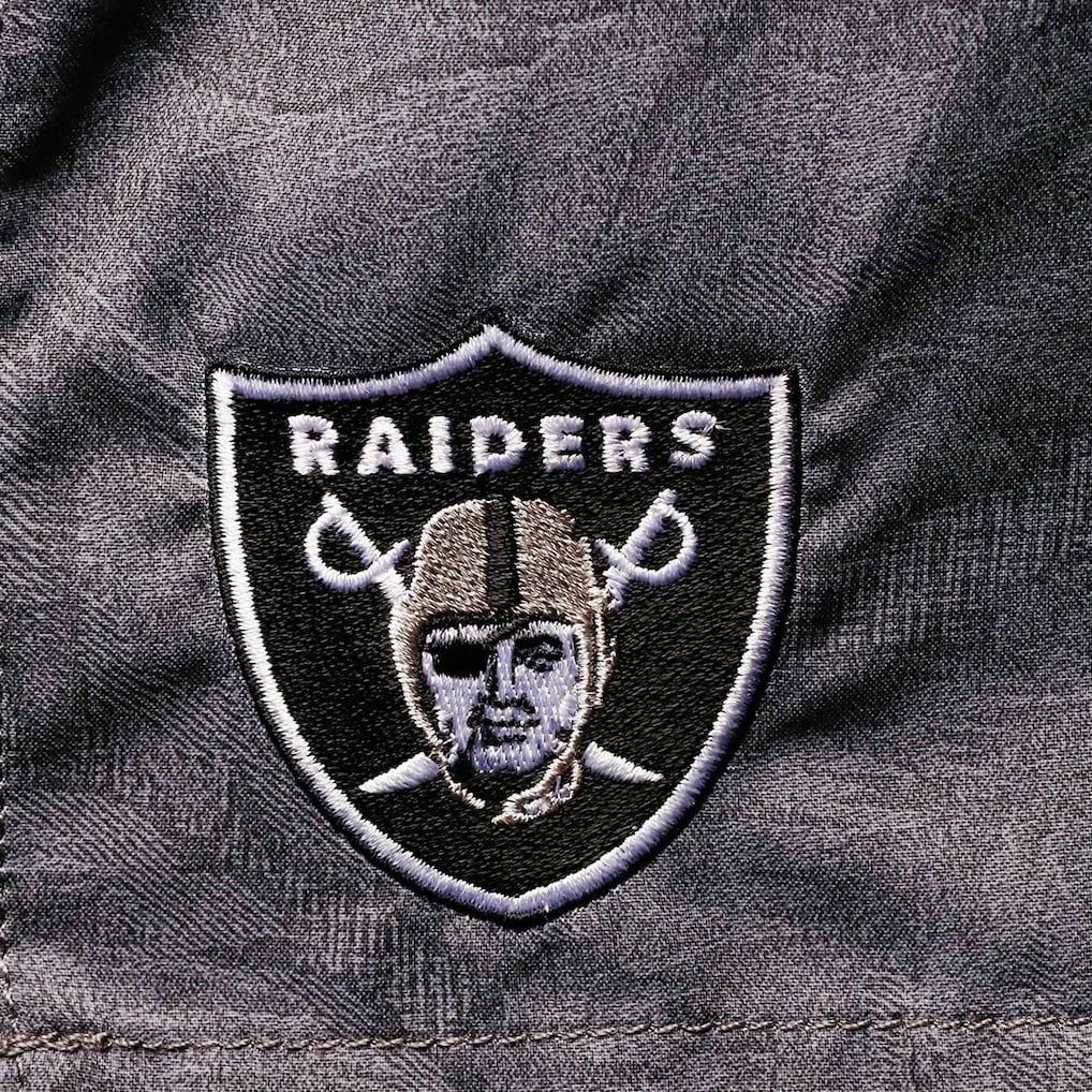 Las Vegas Raiders Tommy Bahama Naples Layered Leaves Swim Trunks